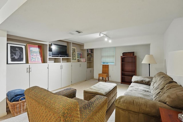 8604 Sagamore Rd, Leawood, KS 66206 - living area featuring light colored carpet and rail lighting