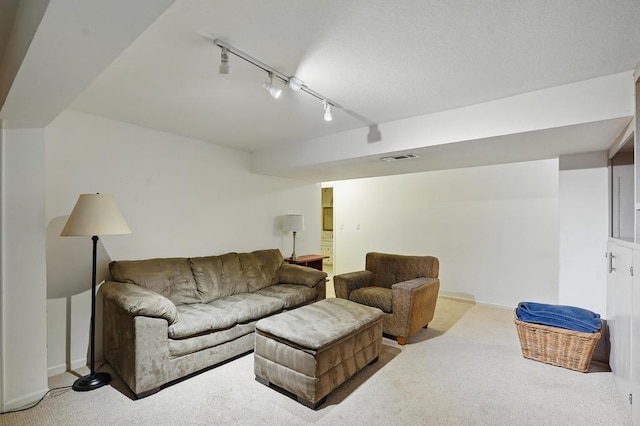 8604 Sagamore Rd, Leawood, KS 66206 - living area featuring light colored carpet and track lighting