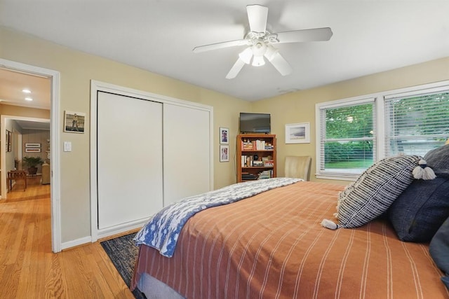 8604 Sagamore Rd, Leawood, KS 66206 - bedroom featuring light wood finished floors, a closet, and ceiling fan