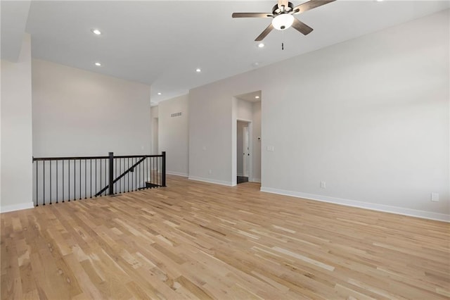 31501 W 86th Ct, De Soto, KS 66018 - empty room with light wood finished floors, a ceiling fan, and recessed lighting