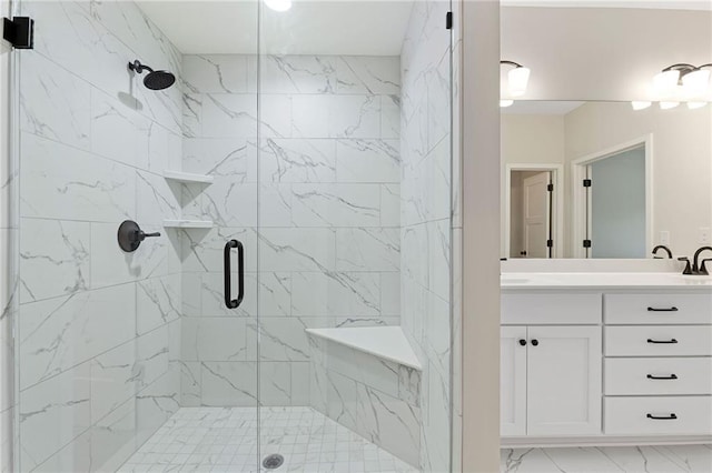 31501 W 86th Ct, De Soto, KS 66018 - bathroom featuring a shower stall, vanity, and marble finish floors