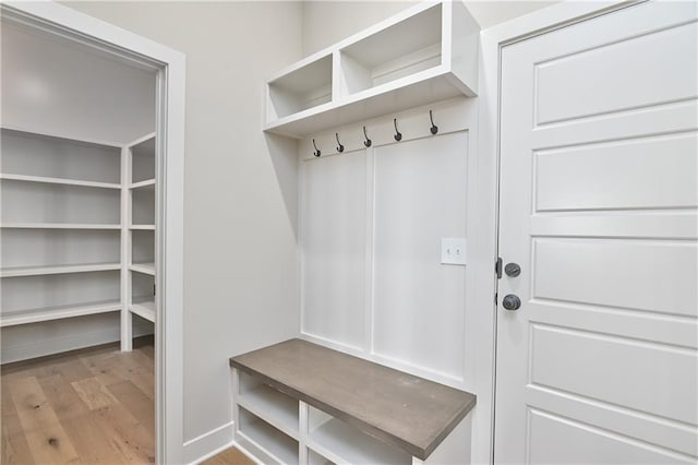 6113 Barth Rd, Shawnee, KS 66226 - mudroom featuring wood finished floors and baseboards