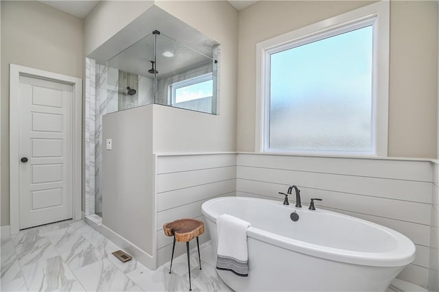 6113 Barth Rd, Shawnee, KS 66226 - full bath featuring marble finish floors, a shower stall, and a soaking tub