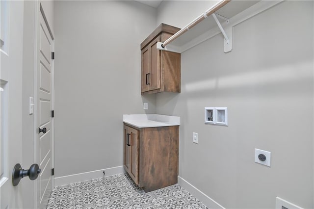 6113 Barth Rd, Shawnee, KS 66226 - laundry room featuring electric dryer hookup, baseboards, hookup for a washing machine, and cabinet space
