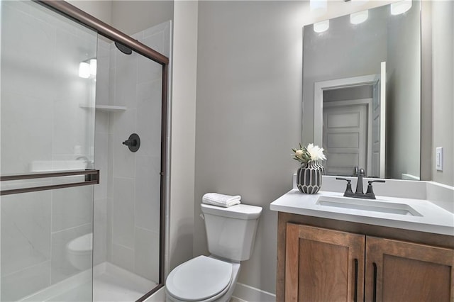 6113 Barth Rd, Shawnee, KS 66226 - bathroom with toilet, vanity, and a stall shower