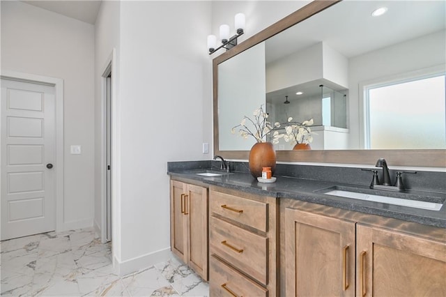 6039 Apache Dr, Shawnee, KS 66226 - bathroom featuring marble finish flooring, double vanity, baseboards, and recessed lighting