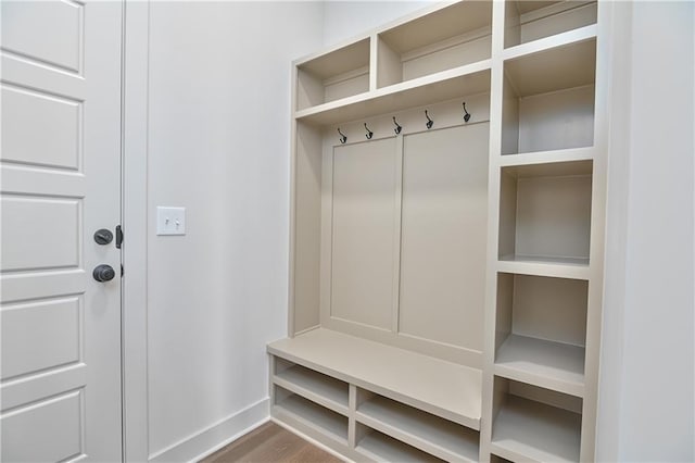 6039 Apache Dr, Shawnee, KS 66226 - mudroom featuring baseboards and wood finished floors
