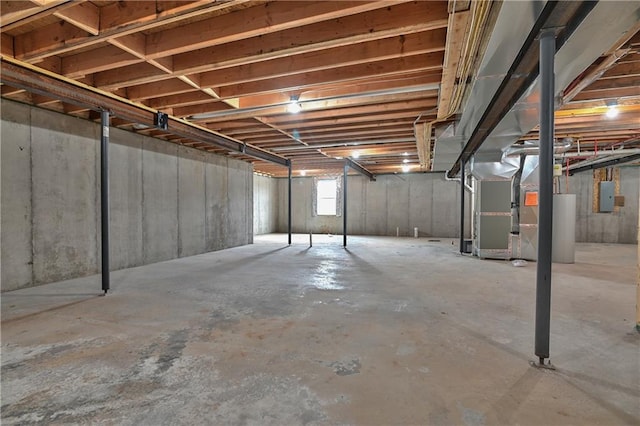 6039 Apache Dr, Shawnee, KS 66226 - basement with heating unit, electric panel, and water heater