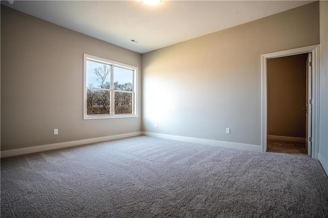 31432 W 85th Ter, De Soto, KS 66018 - carpeted empty room with baseboards