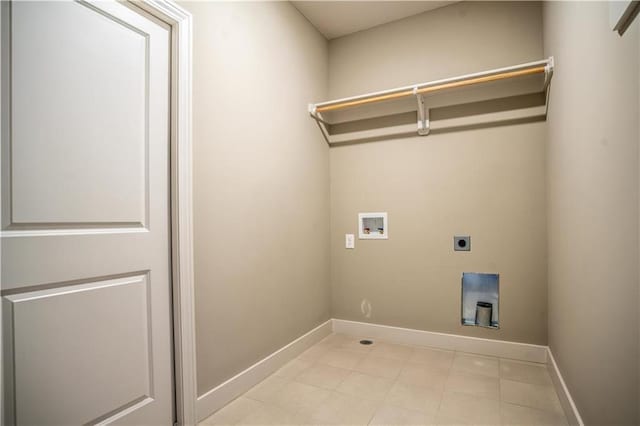 31432 W 85th Ter, De Soto, KS 66018 - laundry room featuring hookup for a washing machine, hookup for an electric dryer, and light tile patterned floors