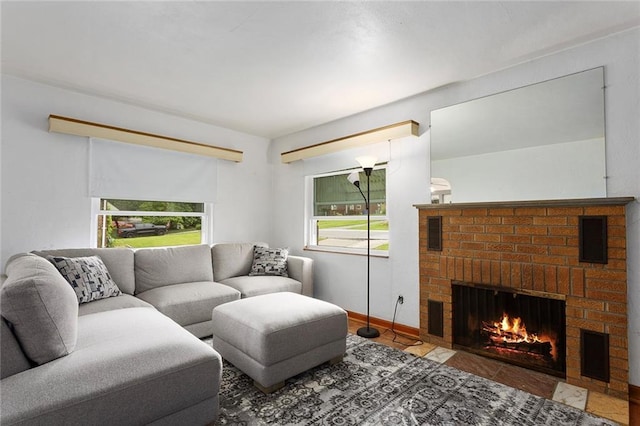 3131 E Barker Cir, Kansas City, KS 66104 - living area with plenty of natural light and a brick fireplace