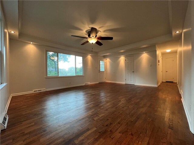 4215 Summit St, Leavenworth, KS 66048 - unfurnished room with a raised ceiling, dark wood finished floors, and ceiling fan