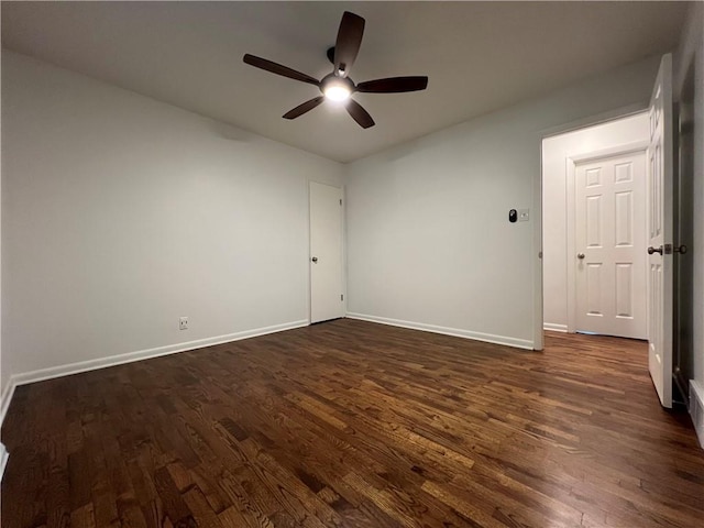4215 Summit St, Leavenworth, KS 66048 - unfurnished room with dark wood-style floors and a ceiling fan