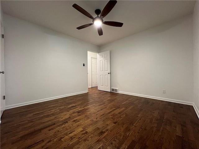 4215 Summit St, Leavenworth, KS 66048 - spare room with a ceiling fan and dark wood finished floors