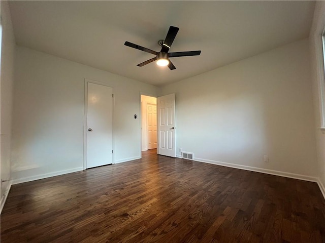 4215 Summit St, Leavenworth, KS 66048 - unfurnished bedroom with dark wood finished floors and a ceiling fan