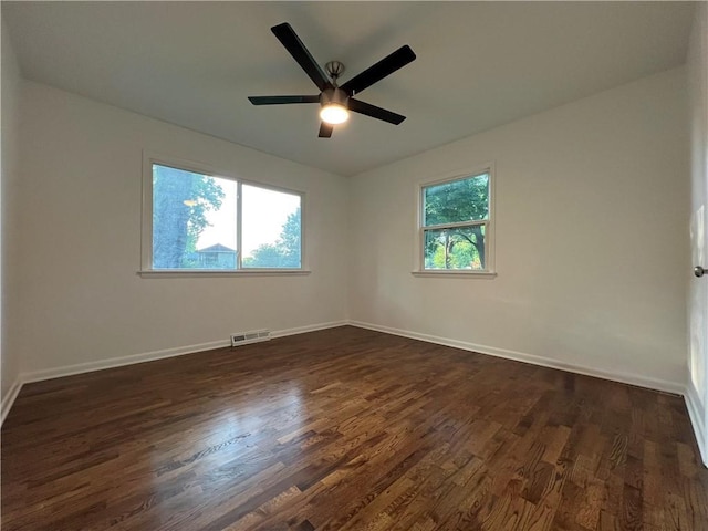 4215 Summit St, Leavenworth, KS 66048 - spare room featuring dark wood-style floors and ceiling fan