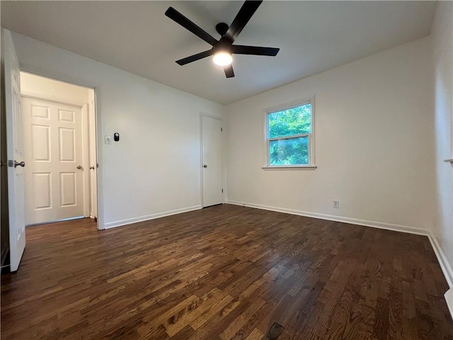 4215 Summit St, Leavenworth, KS 66048 - spare room featuring dark wood finished floors and ceiling fan