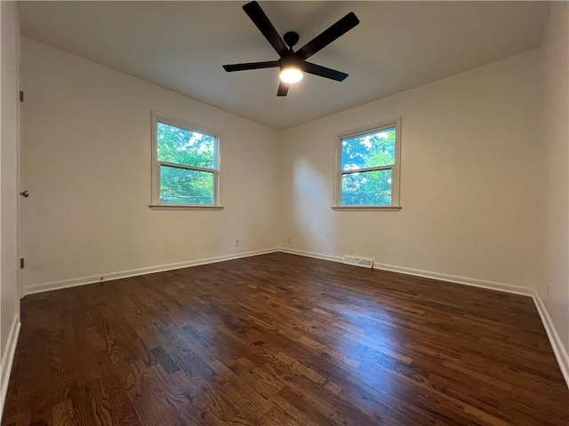 4215 Summit St, Leavenworth, KS 66048 - spare room with plenty of natural light, dark wood finished floors, and ceiling fan