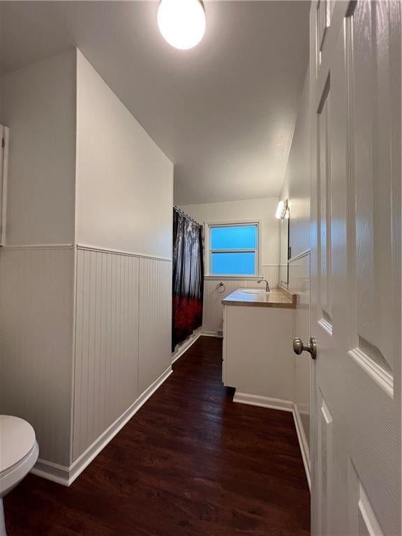 4215 Summit St, Leavenworth, KS 66048 - hall featuring dark wood-type flooring and wainscoting
