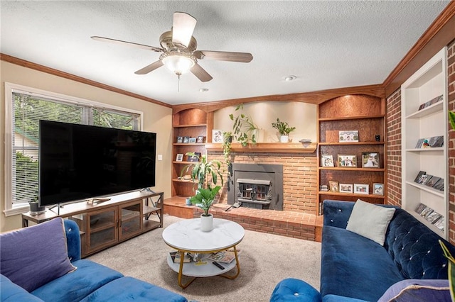1307 W 30th St S, Independence, MO 64052 - living room featuring a textured ceiling, crown molding, ceiling fan, carpet, and built in features