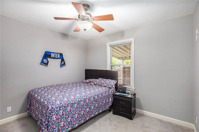 1307 W 30th St S, Independence, MO 64052 - bedroom featuring light colored carpet, baseboards, and a ceiling fan