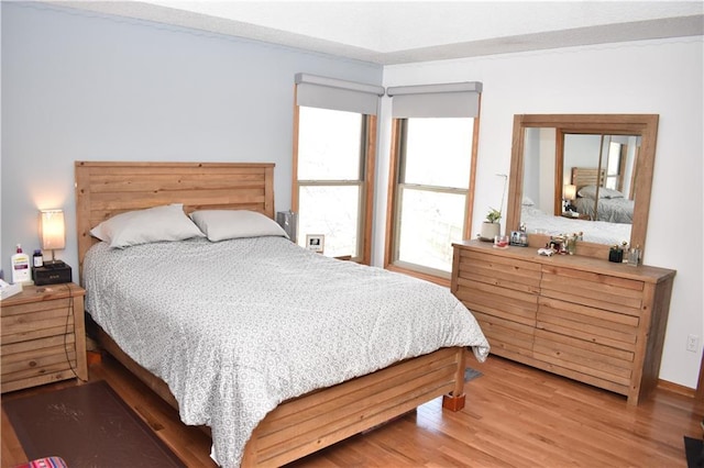 7833 Garnett St, Lenexa, KS 66214 - bedroom featuring light wood-style floors