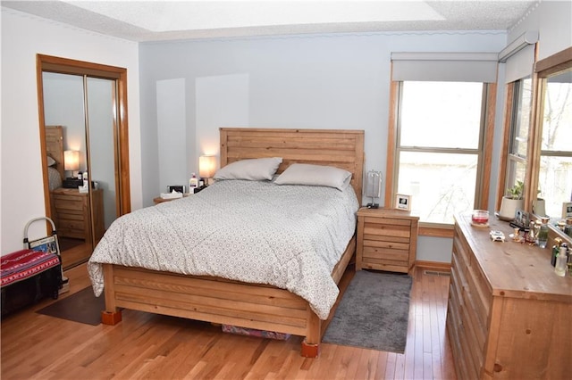 7833 Garnett St, Lenexa, KS 66214 - bedroom featuring wood finished floors