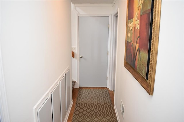 7833 Garnett St, Lenexa, KS 66214 - hall with dark flooring