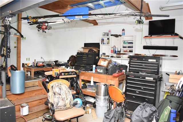 7833 Garnett St, Lenexa, KS 66214 - garage featuring a workshop area