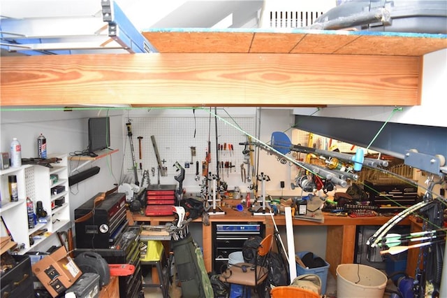 7833 Garnett St, Lenexa, KS 66214 - garage with a workshop area