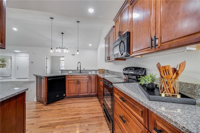812 E 110th Ter, Kansas City, MO 64131 - kitchen featuring black appliances, light wood-type flooring, a peninsula, decorative light fixtures, and light stone countertops