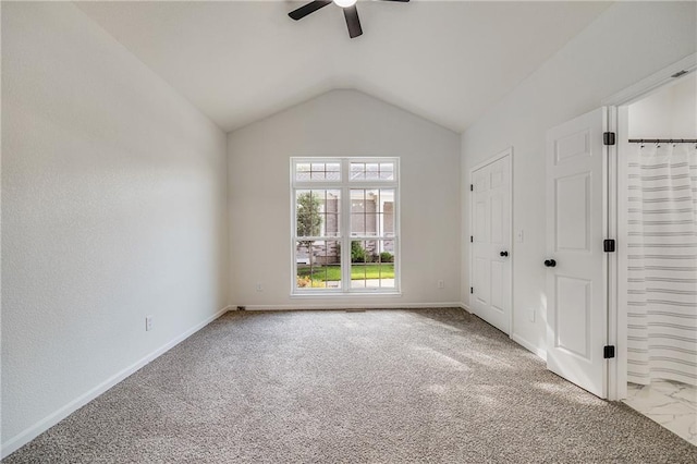 812 E 110th Ter, Kansas City, MO 64131 - unfurnished bedroom with vaulted ceiling, carpet floors, and ceiling fan