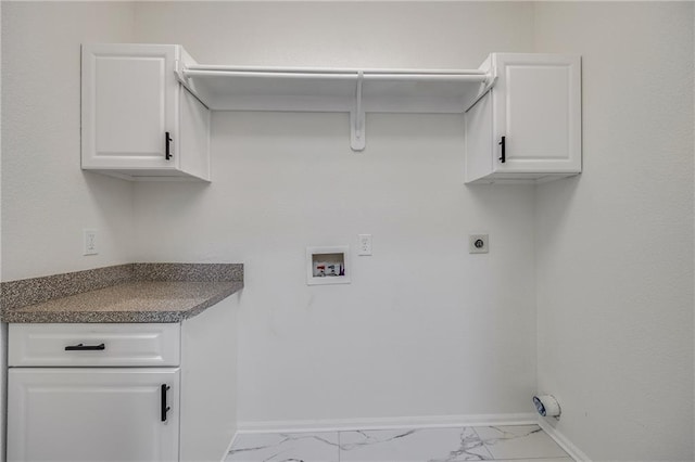 812 E 110th Ter, Kansas City, MO 64131 - laundry area with washer hookup, marble look tiles, cabinet space, and hookup for an electric dryer