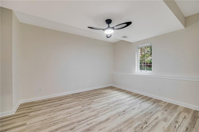 812 E 110th Ter, Kansas City, MO 64131 - spare room with ceiling fan and light wood-style flooring
