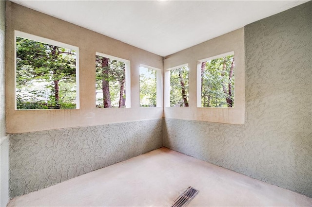 812 E 110th Ter, Kansas City, MO 64131 - unfurnished sunroom with plenty of natural light