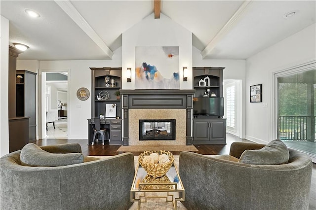 9905 W 144th St, Overland Park, KS 66221 - living area with dark wood-style flooring and a premium fireplace