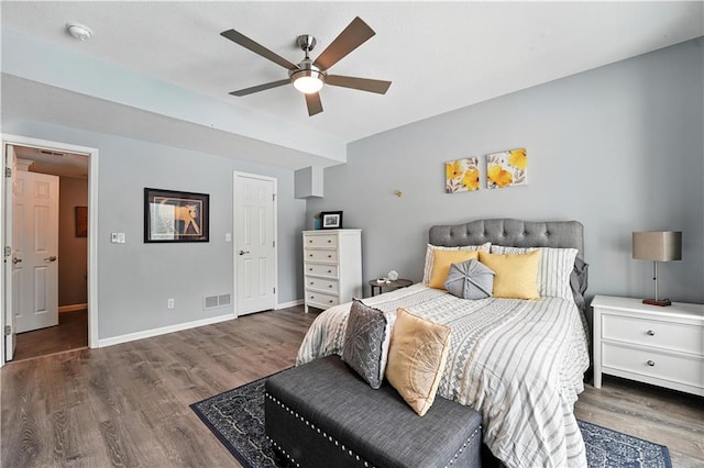 9905 W 144th St, Overland Park, KS 66221 - bedroom with wood finished floors and a ceiling fan