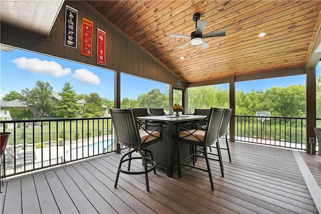 9905 W 144th St, Overland Park, KS 66221 - sunroom / solarium with a ceiling fan, lofted ceiling, plenty of natural light, and outdoor dining space