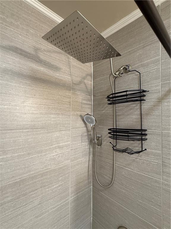 612 W Walnut St, Independence, KS 67301 - bathroom view of tiled shower and ornamental molding