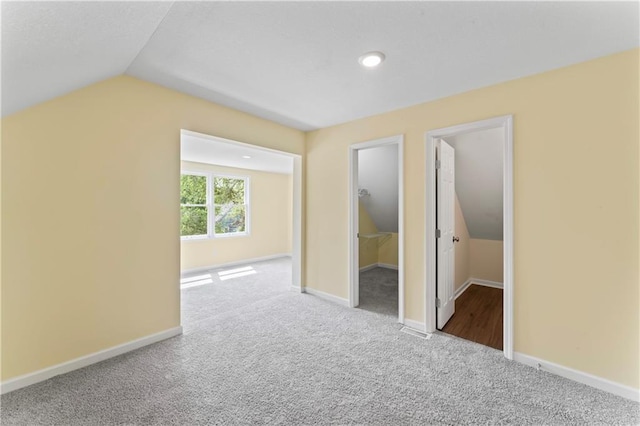 2717 Bales Ave, Kansas City, MO 64128 - bonus room featuring lofted ceiling and carpet