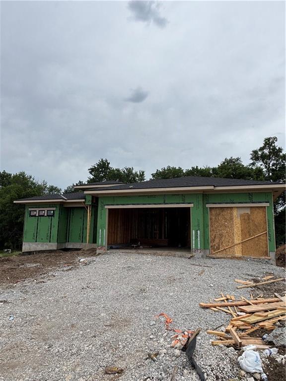 15285 W 162nd St, Olathe, KS 66062 - garage featuring driveway