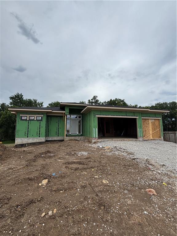 15285 W 162nd St, Olathe, KS 66062 - view of front of home with an attached garage