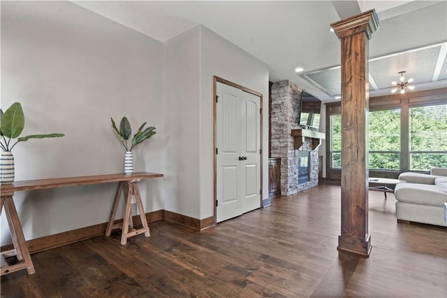 4529 Lakecrest Dr, Shawnee, KS 66218 - foyer featuring decorative columns, wood finished floors, a stone fireplace, and recessed lighting