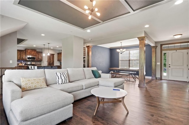 4529 Lakecrest Dr, Shawnee, KS 66218 - living room with a chandelier, ornate columns, dark wood finished floors, and recessed lighting