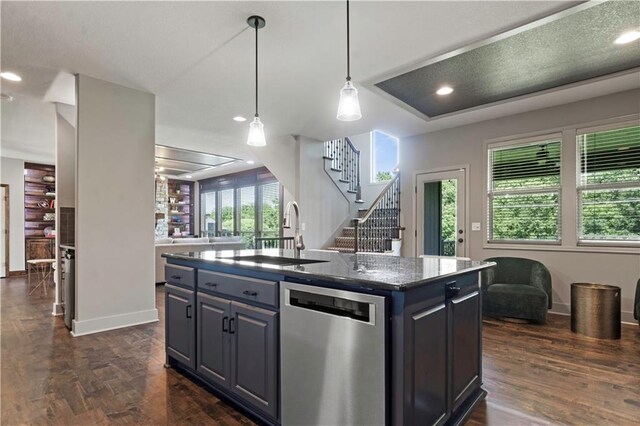 4529 Lakecrest Dr, Shawnee, KS 66218 - kitchen featuring stainless steel dishwasher, a kitchen island with sink, pendant lighting, dark wood-style floors, and recessed lighting
