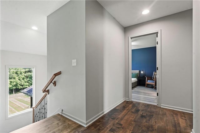 4529 Lakecrest Dr, Shawnee, KS 66218 - hall with an upstairs landing, wood finished floors, and recessed lighting