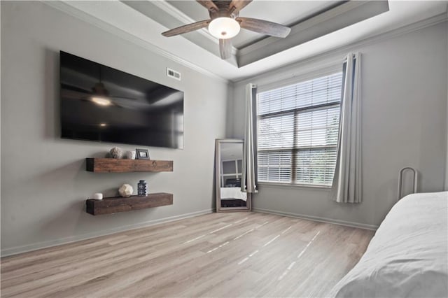 4529 Lakecrest Dr, Shawnee, KS 66218 - bedroom featuring a raised ceiling, ornamental molding, wood finished floors, and a ceiling fan
