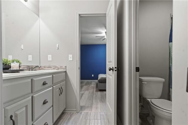 4529 Lakecrest Dr, Shawnee, KS 66218 - ensuite bathroom with vanity and a textured ceiling