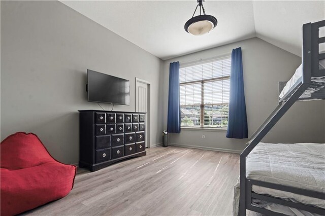 4529 Lakecrest Dr, Shawnee, KS 66218 - bedroom with wood finished floors and lofted ceiling