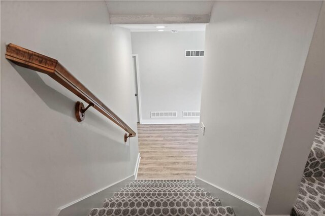 4529 Lakecrest Dr, Shawnee, KS 66218 - staircase with baseboards and wood finished floors